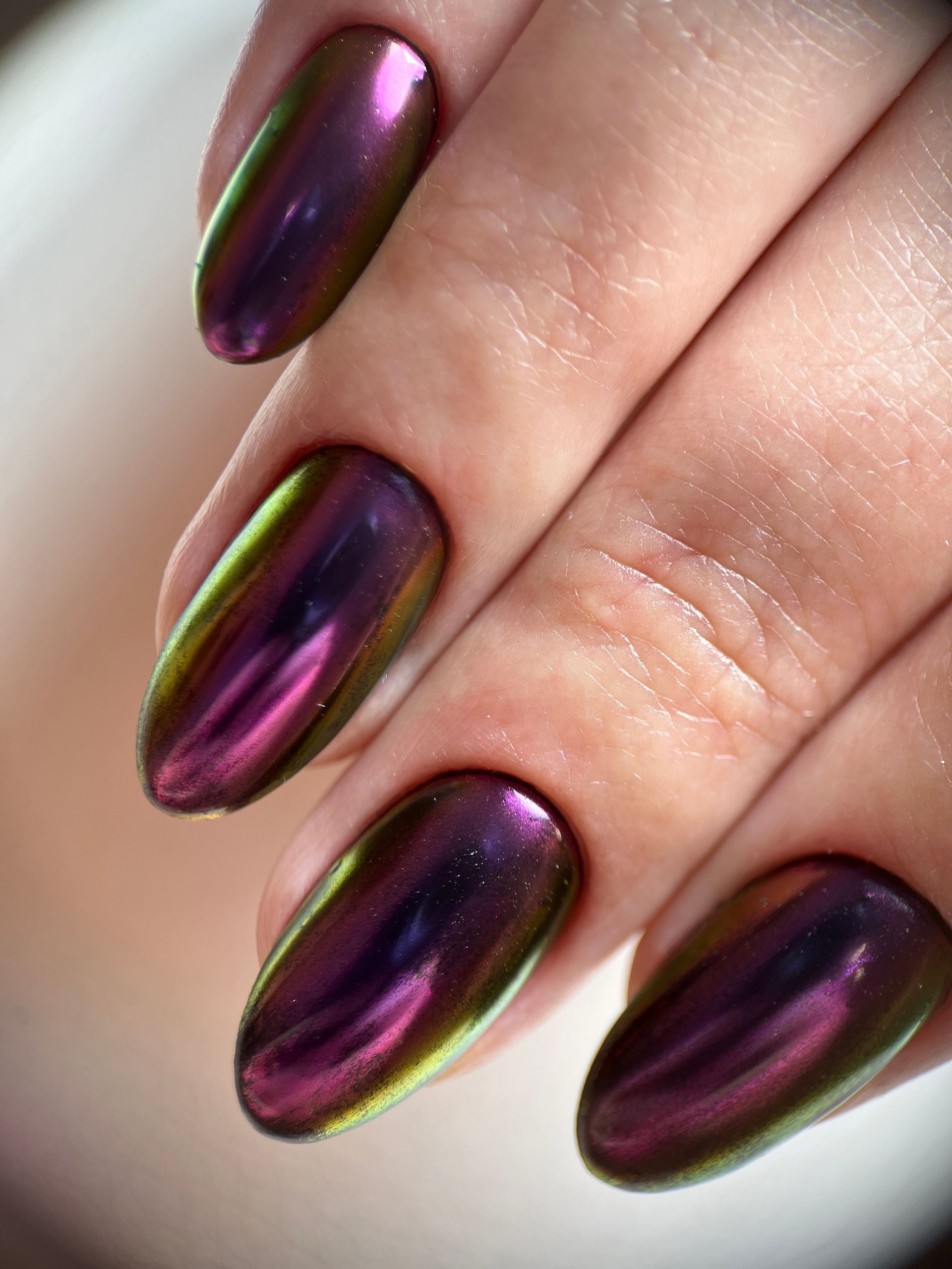 Beautiful chrome nail art with trendy gel polish